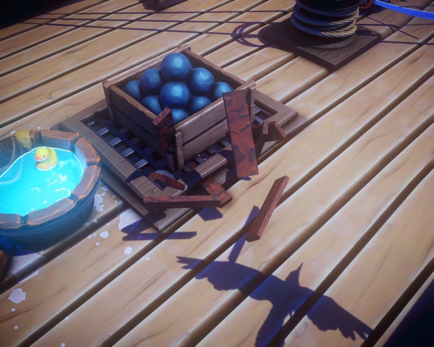 A crate smashing apart on deck next to cannonballs and a rubber duck tub