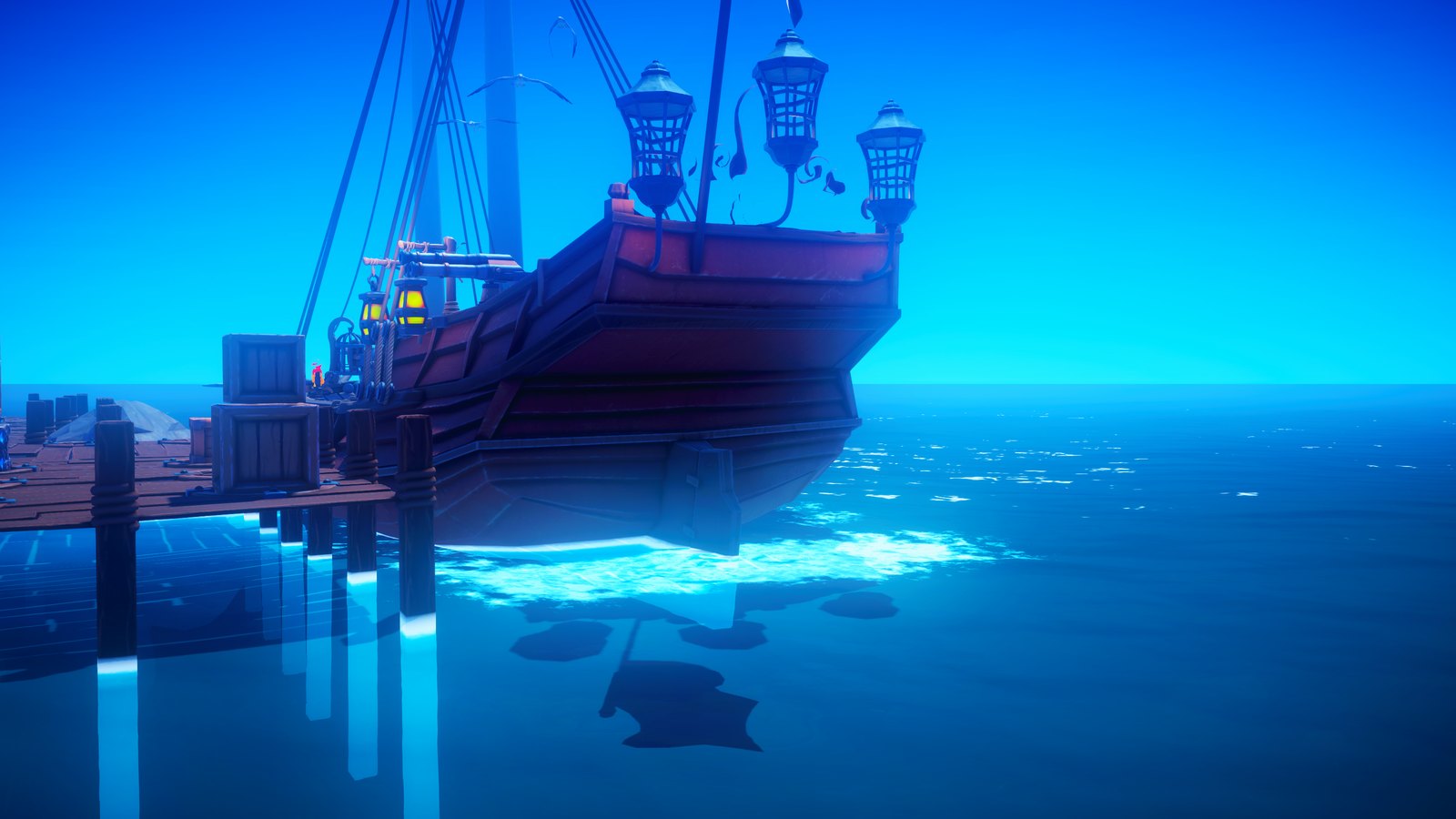 The stern of the ship with its lanterns at a wooden pier